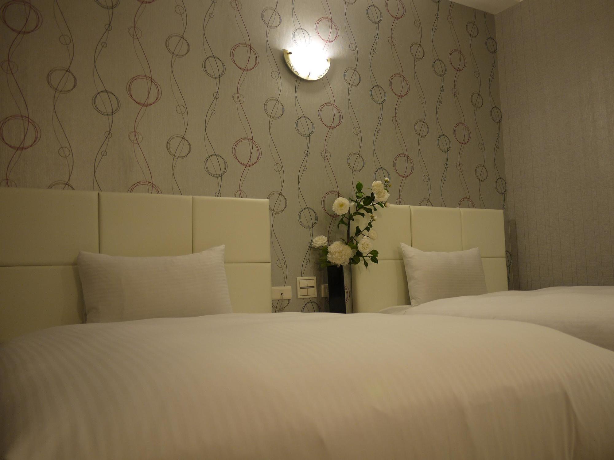 טאינאן Just Enjoy Business Hotel מראה חיצוני תמונה